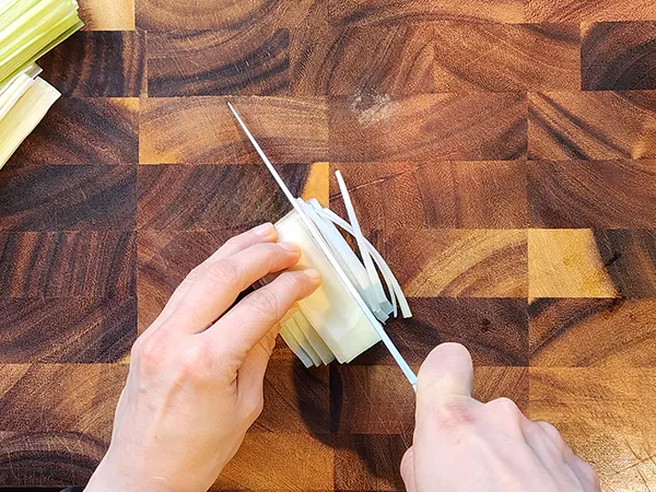 Prepping leek for a julliene cut