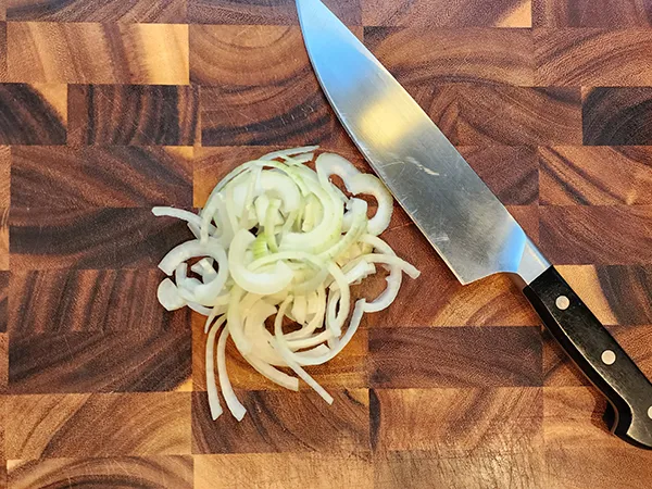 Half moon sliced onions