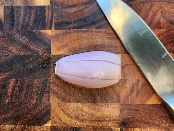 Cutting a shallot onion