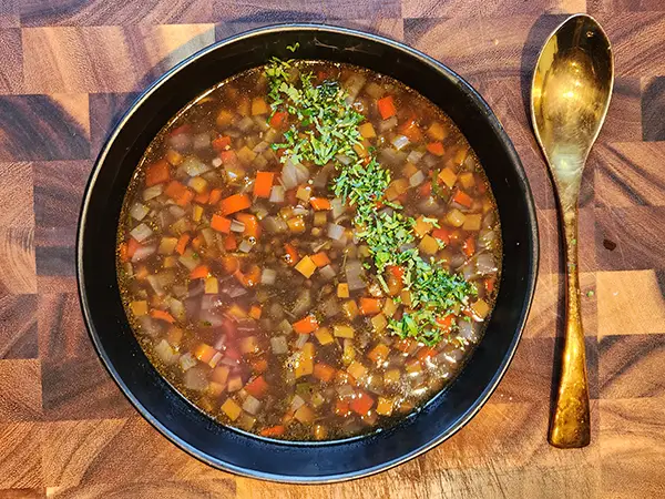 Black lentil soup in the bowl