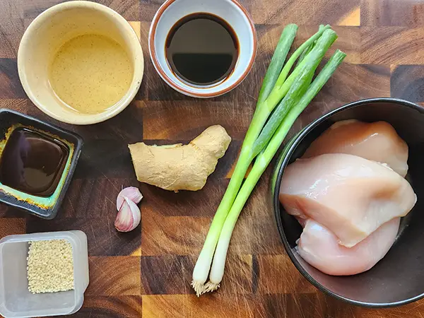 Asian style chicken bites ingredientds on the wooden board
