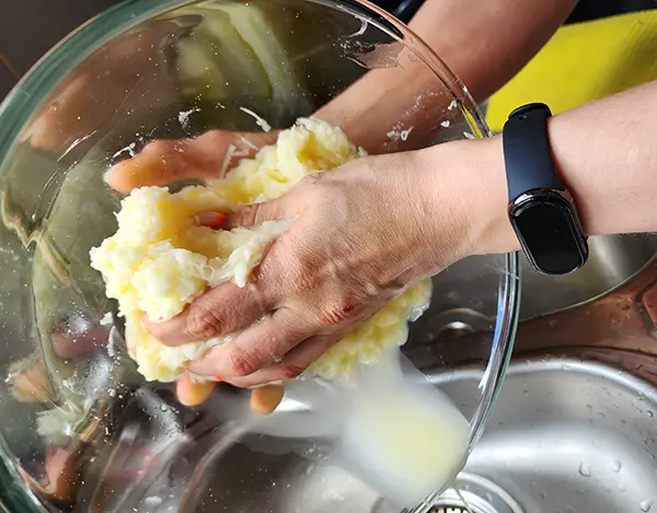 Grating potato pancakes