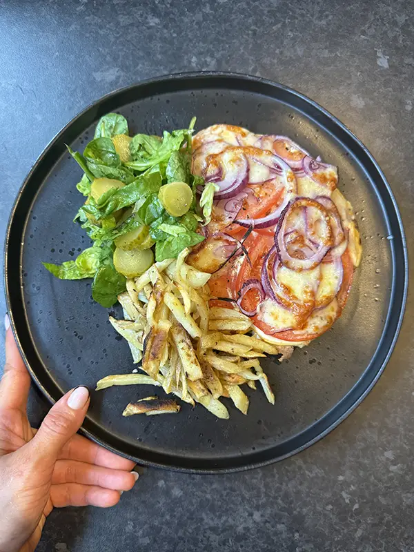 Chicken cutlets with cooked potatoes and a fresh salad